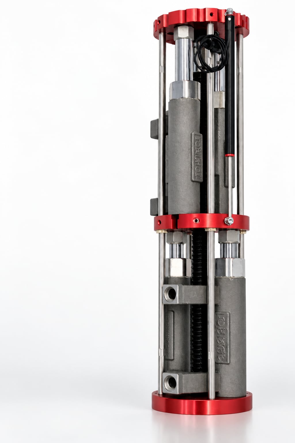 A Fluidic Linear Displacement Pump — twin metering bodies on stainless tie rods between red anodised end plates